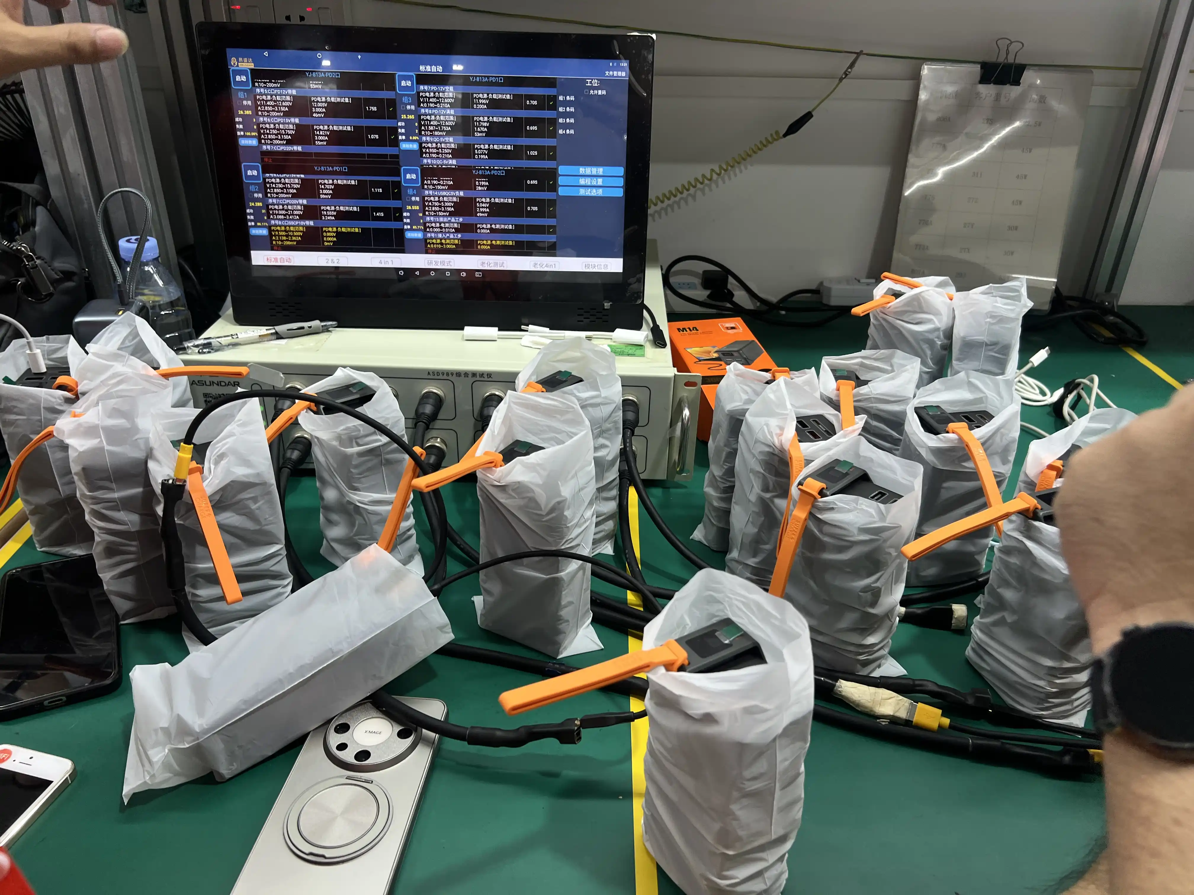 Multi-Output PD 3.1 Power Bank Sampling, Dual-Port QC Multi-output USB-C PD 3.1 power bank sampling inspection with simultaneous dual-port voltage verification at OEM factory for PD protocol compliance