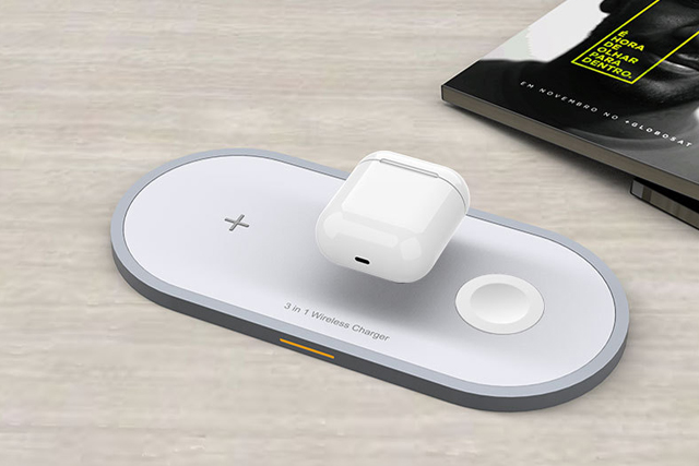 3-in-1 wireless charging stand simultaneously powering an iPhone, Apple Watch, and Airpods.